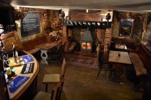 an overhead view of a restaurant with a fireplace at The Benett Arms in Shaftesbury
