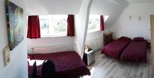 Postel nebo postele na pokoji v ubytování Hotel Baan