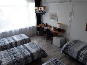 Postel nebo postele na pokoji v ubytování Hotel Baan