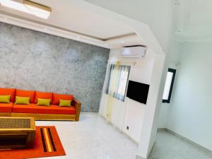 Μια τηλεόραση ή/και κέντρο ψυχαγωγίας στο Quatre appartements en location a Saly-Senegal