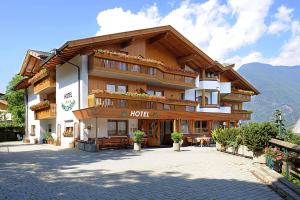 a hotel in the mountains with at Hotel Waldheim in Natz-Schabs