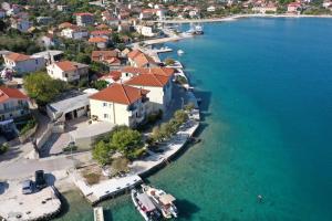 an aerial view of a small island in the water at Apartments Babin in Vinišće