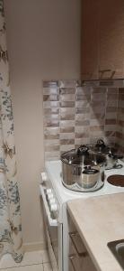 Kuchyň nebo kuchyňský kout v ubytování SEA VIEW APARTMENTS Artemis