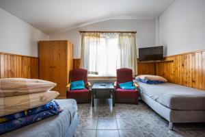 Postel nebo postele na pokoji v ubytování VillaDudek