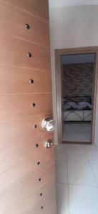 Postel nebo postele na pokoji v ubytování SEA VIEW APARTMENTS Artemis