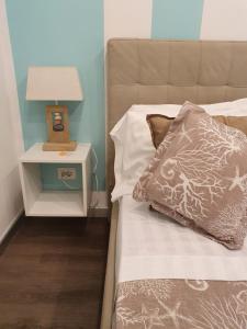 Postel nebo postele na pokoji v ubytování B&B Il Saraceno