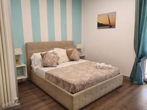 Postel nebo postele na pokoji v ubytování B&B Il Saraceno