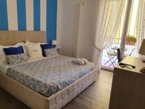 Postel nebo postele na pokoji v ubytování B&B Il Saraceno