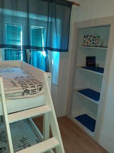 Postel nebo postele na pokoji v ubytování Apartment Sea Stone