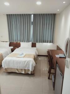 Katil atau katil-katil dalam bilik di Frank B&B