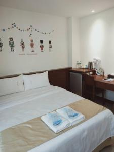 Katil atau katil-katil dalam bilik di Frank B&B