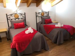 Ein Bett oder Betten in einem Zimmer der Unterkunft LA PANDELA