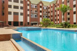 The swimming pool at or close to Hawthorn Suites by Wyndham Abuja