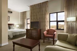 A television and/or entertainment centre at Hawthorn Suites by Wyndham Abuja