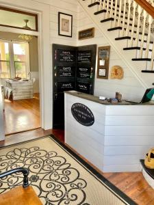 a home bar with a staircase in a house at The Panguitch House in Panguitch