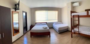 Postel nebo postele na pokoji v ubytování Hotel Arena Blanca