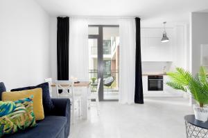 Kuchyňa alebo kuchynka v ubytovaní Elite Apartments Garden Gates Premium