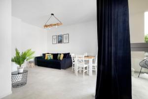 Posedenie v ubytovaní Elite Apartments Garden Gates Premium
