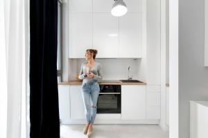 Kuchyňa alebo kuchynka v ubytovaní Elite Apartments Garden Gates Premium