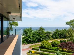 a view of the ocean from a building at VacationClub – Seaside Park Apartament 316 in Kołobrzeg