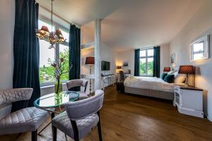 Postelja oz. postelje v sobi nastanitve VILLA TAEGERMOOS
