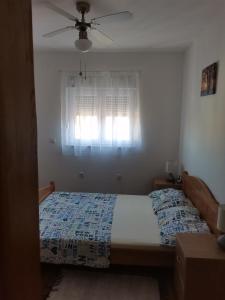 Postel nebo postele na pokoji v ubytování Apartment Mark