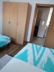 Postel nebo postele na pokoji v ubytování Apartment Mark