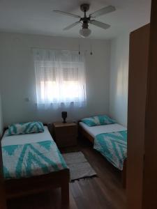 Postel nebo postele na pokoji v ubytování Apartment Mark + 37 fotografií