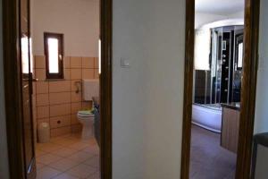 Koupelna v ubytování Deluxe Port View Apartment