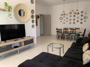 Μια τηλεόραση ή/και κέντρο ψυχαγωγίας στο Corredera Rooms