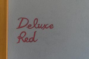 a book with the words drive red written on it at B&B La Fontanella in Riccò del Golfo di Spezia