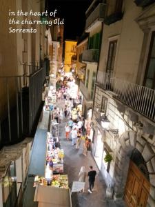 an overhead view of a street with people in a market at Sorrento City Center Atmosphere in Sorrento