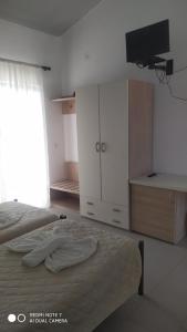 Postel nebo postele na pokoji v ubytování Monika Hotel Sidari