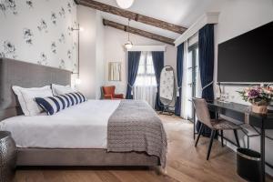 Postel nebo postele na pokoji v ubytování Zamarin Hotel & Spa