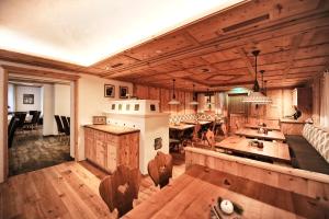 Kuchyň nebo kuchyňský kout v ubytování Hotel Arnika