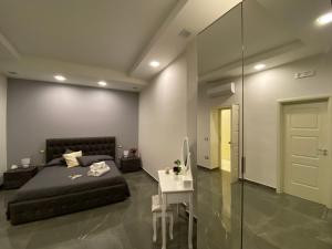 A seating area at Porto Rooms & Suite