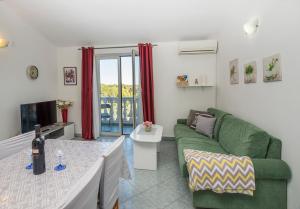 Χώρος καθιστικού στο Apartman, studio and room Kata