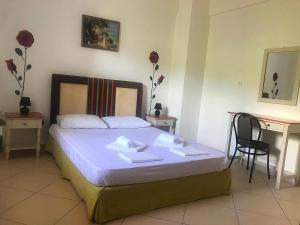 Postel nebo postele na pokoji v ubytování Teo Apartments Gouvia