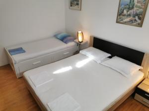 Posteľ alebo postele v izbe v ubytovaní Apartment Miljenko Tomic 2