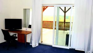 TV o dispositivi per l'intrattenimento presso Hotel Dvůr