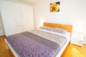 Postel nebo postele na pokoji v ubytování Apartment Nives