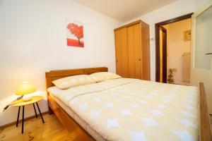 Postel nebo postele na pokoji v ubytování Apartment Nives