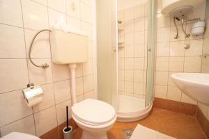 Koupelna v ubytování Apartment Nives