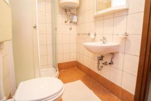 Koupelna v ubytování Apartment Nives