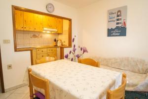 Kuchyň nebo kuchyňský kout v ubytování Apartment Nives
