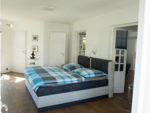 a bedroom with a bed with two pillows on it at Ferienwohnung am Rheinsteig in Bendorf