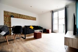 Seating area sa Le Patio - Appartement 2 chambres dans quartier recherché