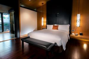 Letto o letti in una camera di Silks Place Yilan