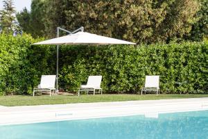 The swimming pool at or close to Masseria Lacatena