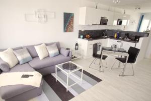 Posezení v ubytování Apartment Portonovo Paraiso - Sea View - Piscina - Wifi - Old Town